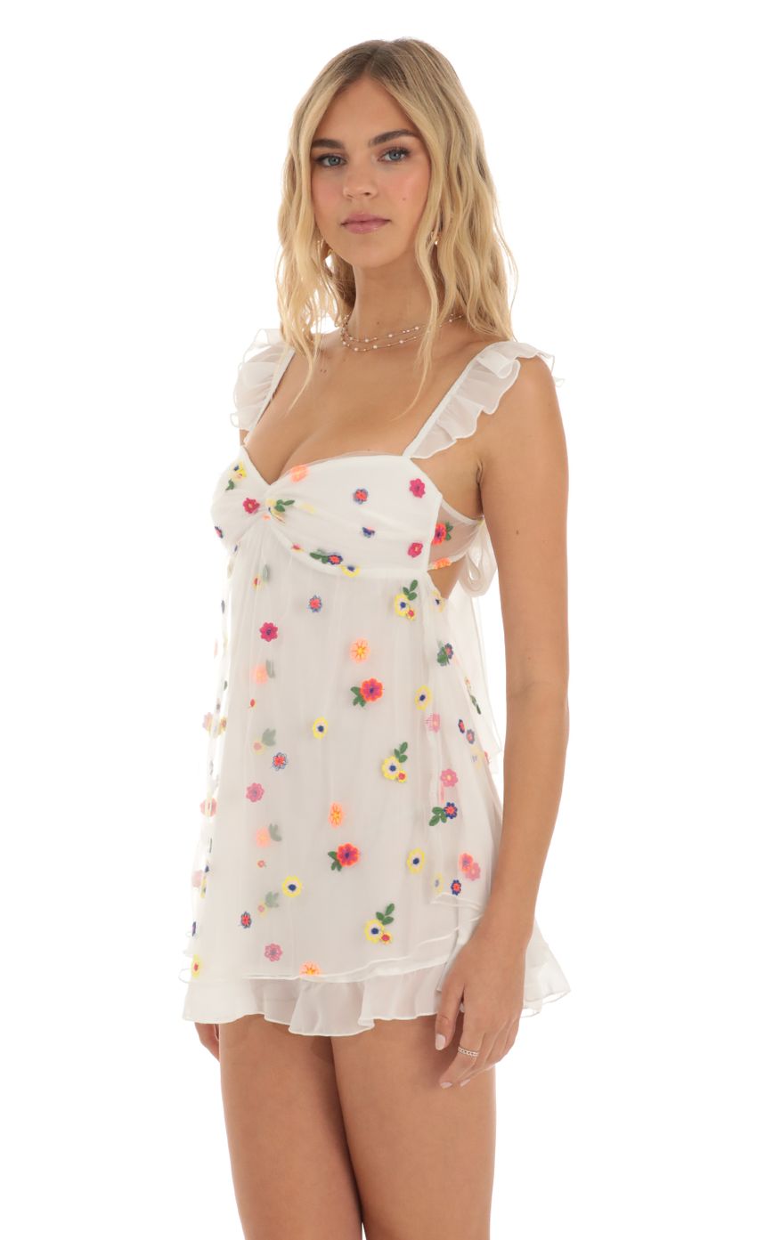 Picture Multi Floral Babydoll Dress in White. Source: https://media-img.lucyinthesky.com/data/May23/850xAUTO/e0250b1d-4bd3-4ecd-a013-6c7b6f80f35a.jpg