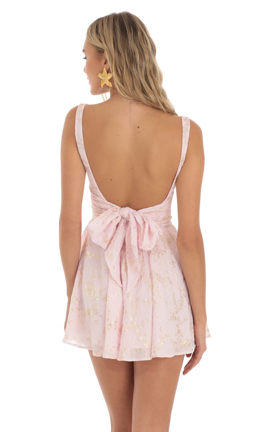 Picture Floral Shimmer Mini Dress in Pink. Source: https://media-img.lucyinthesky.com/data/May23/850xAUTO/eab6e910-667a-4058-827f-04635030b68d.jpg