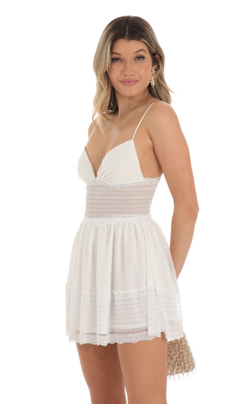 Picture Dotted Chiffon Dress With Lace Inserts in White. Source: https://media-img.lucyinthesky.com/data/May23/850xAUTO/f27aedbf-0393-4496-8bf0-cae5fa824d40.jpg