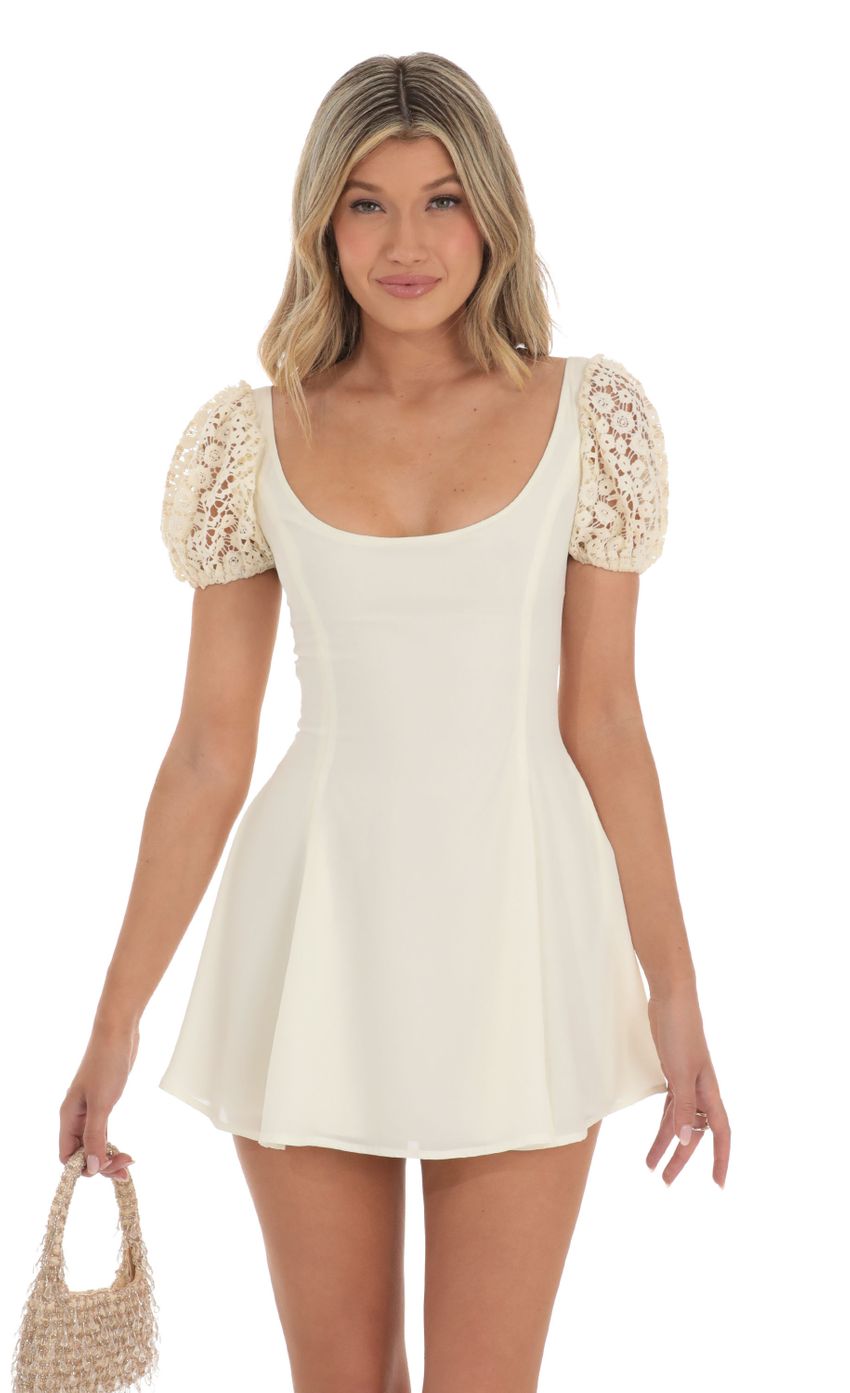 Picture Puff Sleeve Dress in Cream with Crochet Sleeves. Source: https://media-img.lucyinthesky.com/data/May23/850xAUTO/f43c29e7-d28c-4b20-a539-7c531a325fc8.jpg