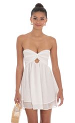 Picture Shimmer Cutout Babydoll Dress in White. Source: https://media-img.lucyinthesky.com/data/May24/150xAUTO/1fb96a9c-e9fd-490c-afe8-68025058f2b6.jpg