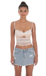 Picture Two Toned Lace Top in White. Source: https://media-img.lucyinthesky.com/data/May24/150xAUTO/497b642c-c93c-40fa-a508-d5c6437e03a8.jpg