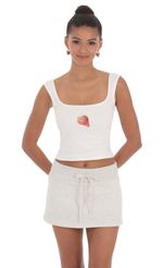 Picture Flower Slit Skirt in White. Source: https://media-img.lucyinthesky.com/data/May24/150xAUTO/4e3b135d-6bbf-489f-9e8e-7e6467eb585f.jpg