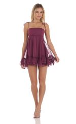 Picture Baby Doll Dress in Purple. Source: https://media-img.lucyinthesky.com/data/May24/150xAUTO/9034aa21-8309-4e9b-a326-9053e21d2a5b.jpg