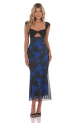 Picture Lace Cutout Floral Maxi Dress in Black and Blue. Source: https://media-img.lucyinthesky.com/data/May24/150xAUTO/94514b02-ba06-4aa2-ac3c-813293a1e199.jpg