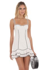 Picture Black Thread Ruffle Dress in White. Source: https://media-img.lucyinthesky.com/data/May24/150xAUTO/9d2cafca-179e-4164-b730-bc812bbcf20c.jpg