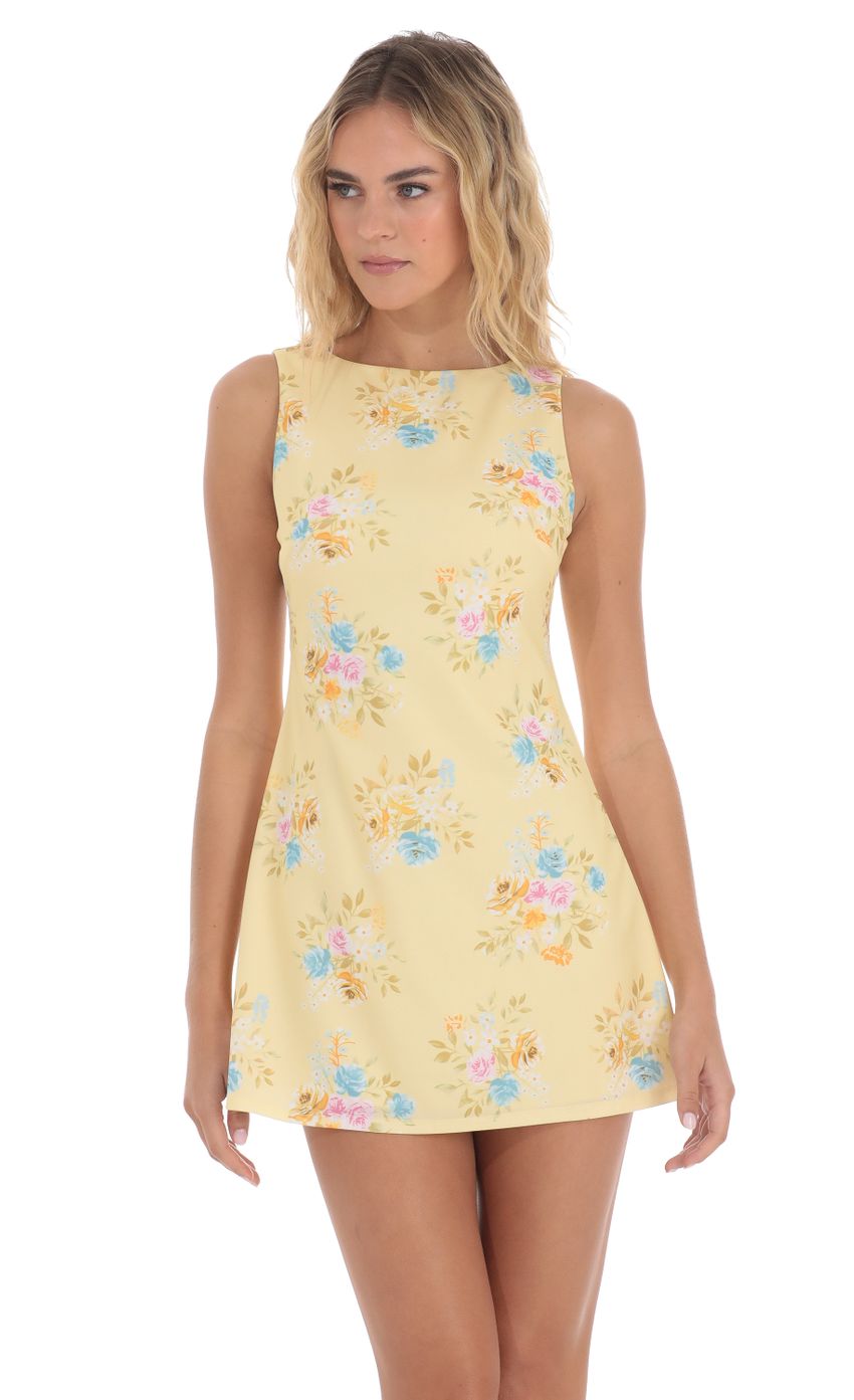 Picture Floral High Neck Dress in Yellow. Source: https://media-img.lucyinthesky.com/data/May24/850xAUTO/03bb1e89-2da9-4435-b112-088f5e9d0acf.jpg