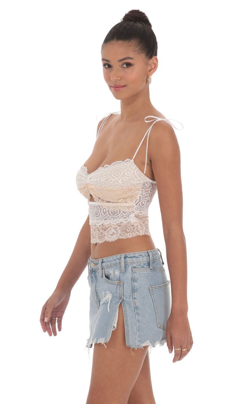 Picture Two Toned Lace Top in White. Source: https://media-img.lucyinthesky.com/data/May24/850xAUTO/0e08ea72-eb3f-4ccc-8a31-d8118a176754.jpg