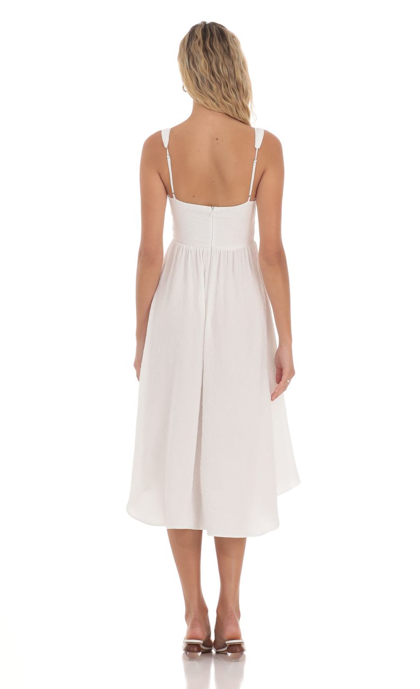 Picture Jacquard Flare Midi Dress in White. Source: https://media-img.lucyinthesky.com/data/May24/850xAUTO/12416748-b3a7-4dc5-b211-c97aa044ec42.jpg