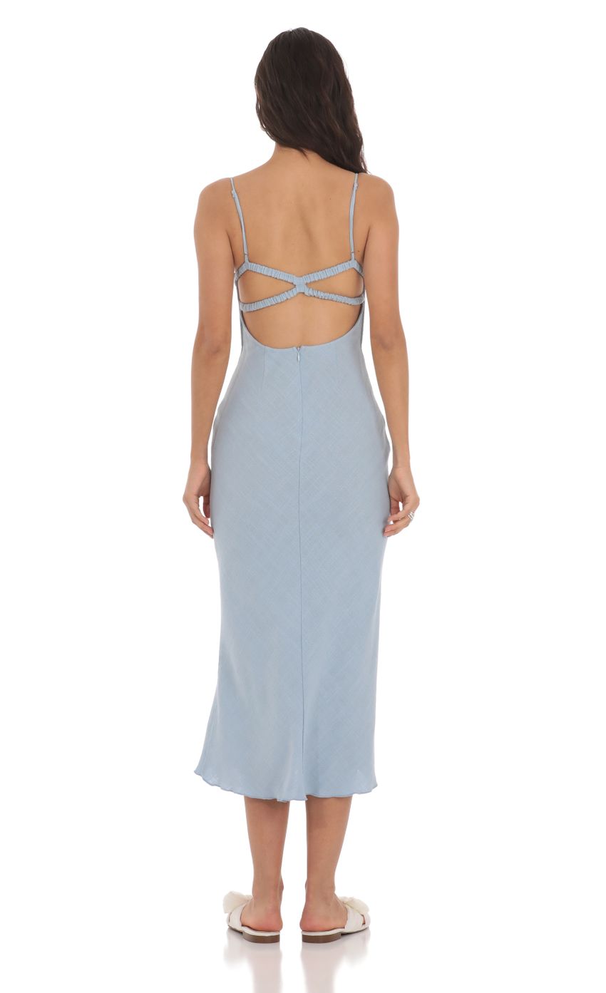 Picture Linen Open Back Midi Dress in Blue. Source: https://media-img.lucyinthesky.com/data/May24/850xAUTO/182a0c49-4e33-4239-981d-857c19888062.jpg