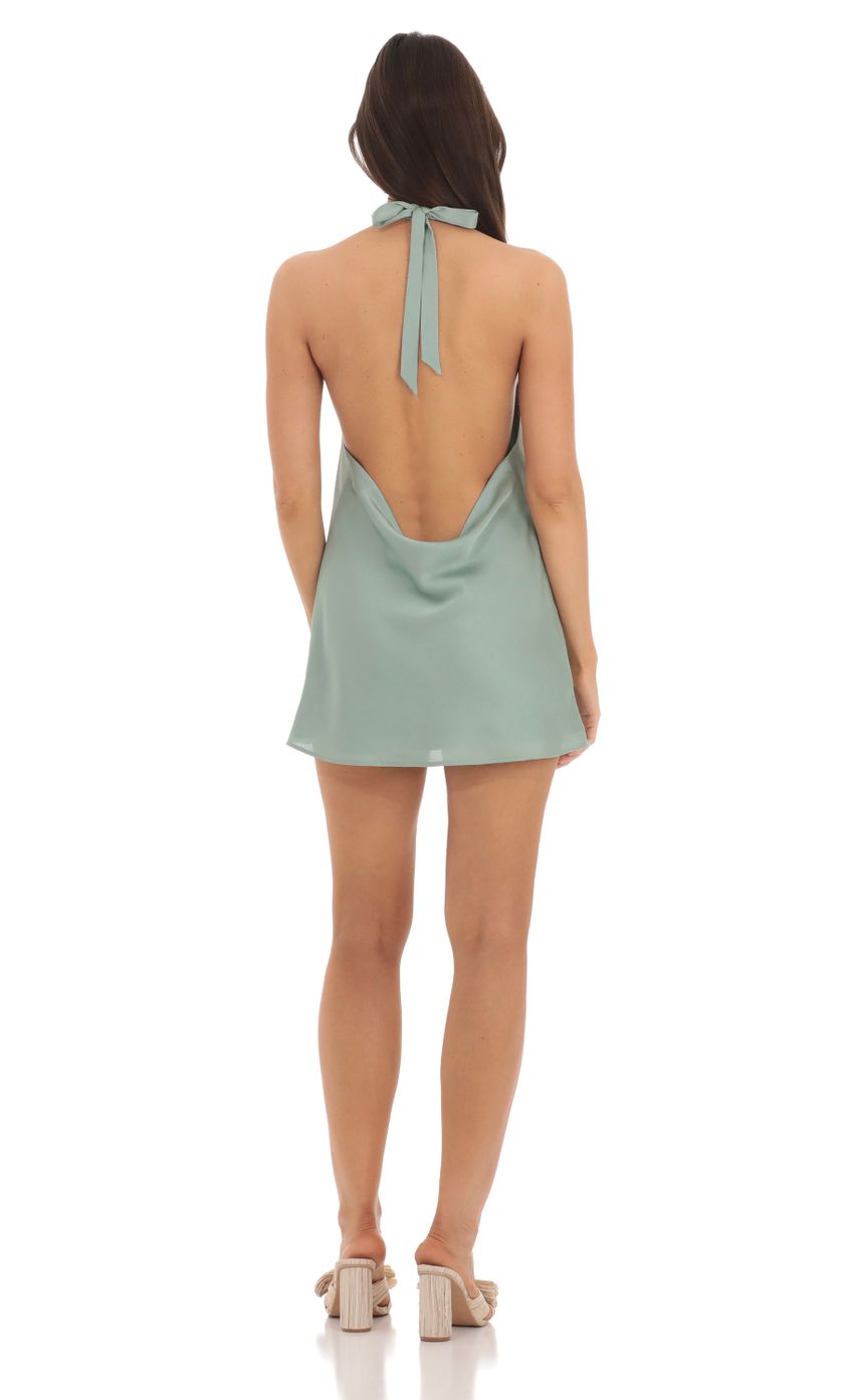 Picture Satin Halter Open Back Dress in Sage. Source: https://media-img.lucyinthesky.com/data/May24/850xAUTO/19c73c7a-a46f-4107-b402-cecd744a22ad.jpg