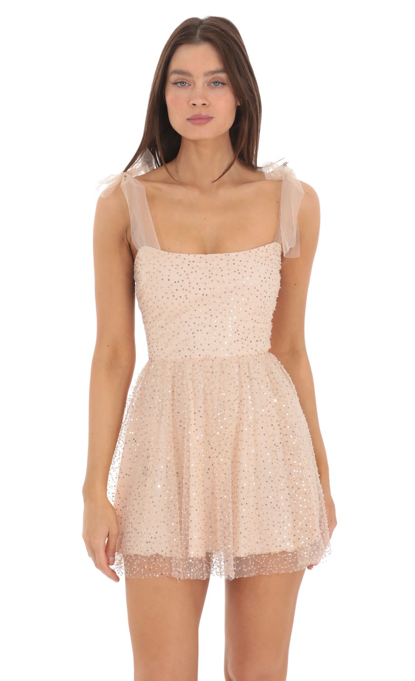 Picture Sequin Beaded A-line Dress in Beige. Source: https://media-img.lucyinthesky.com/data/May24/850xAUTO/1d70b352-9774-4008-be37-d461bc2e0e83.jpg