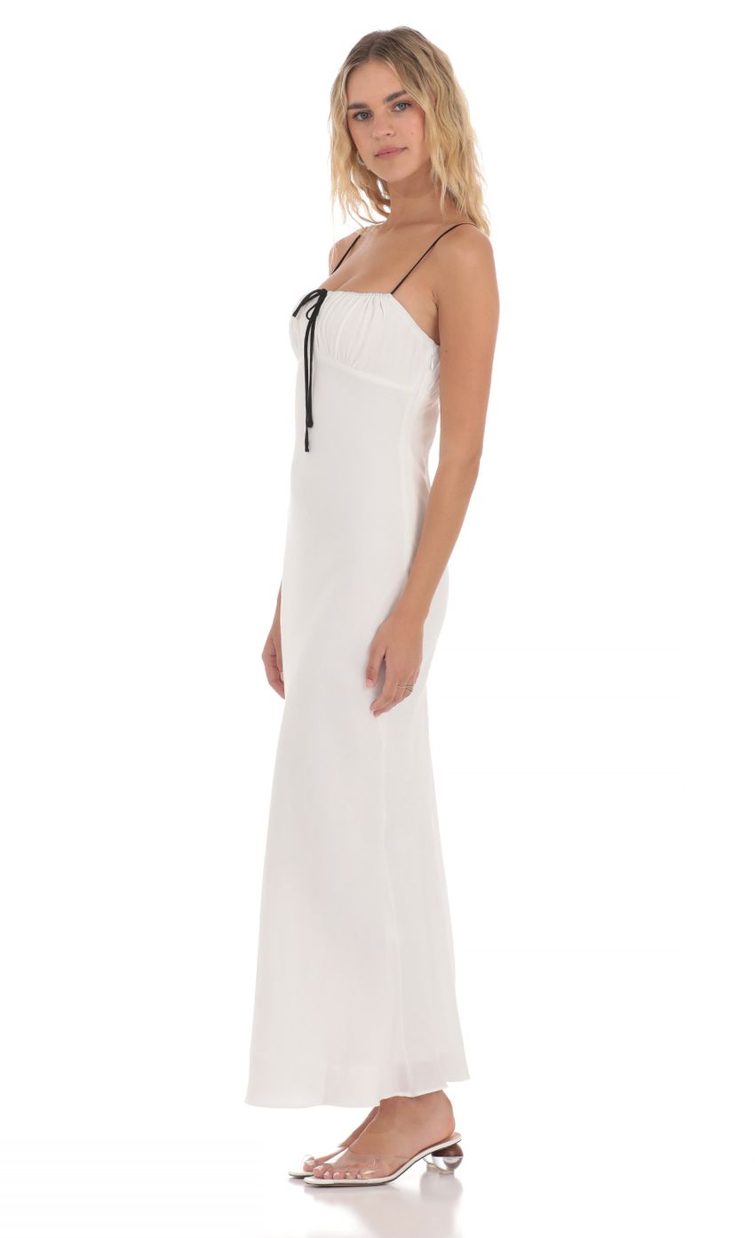 Picture Front Tie Maxi Dress in White. Source: https://media-img.lucyinthesky.com/data/May24/850xAUTO/1ede3127-1960-420c-bb63-222d6e48e034.jpg