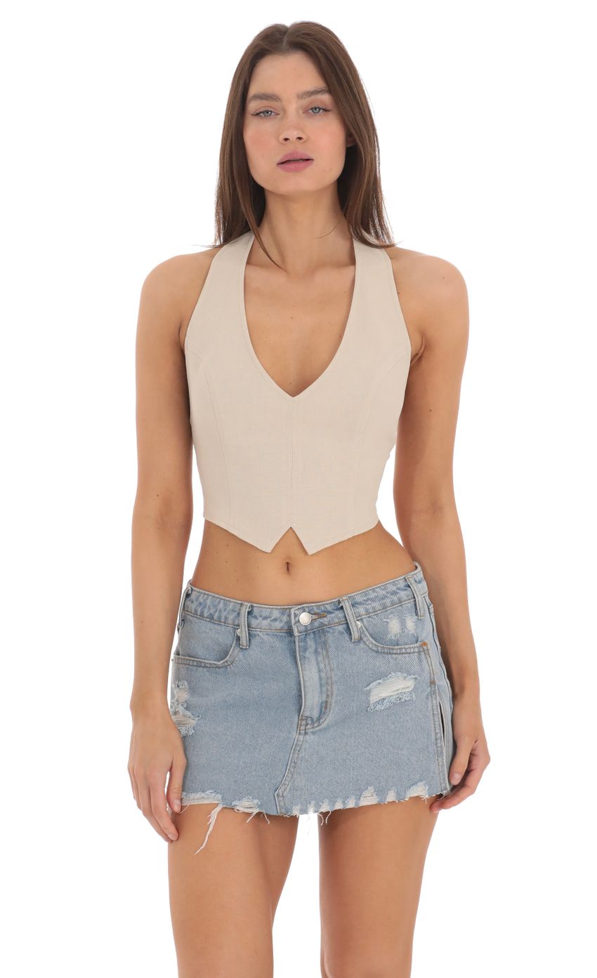 Picture Linen Halter Top in Beige. Source: https://media-img.lucyinthesky.com/data/May24/850xAUTO/2303d7d3-cd6f-46f7-b6d6-e96a8383ca3d.jpg