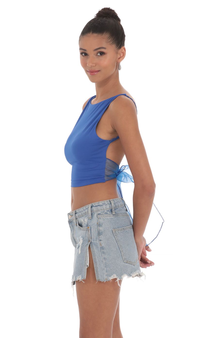 Picture Embroidered Open Back Top in Blue. Source: https://media-img.lucyinthesky.com/data/May24/850xAUTO/24400045-c03c-4300-b5cf-6eda7694d8fa.jpg