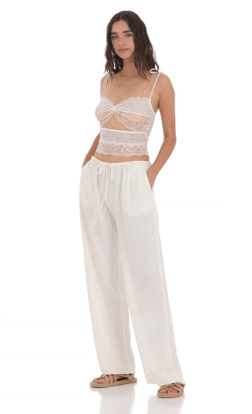 Picture Linen Drawstring Pants in Cream. Source: https://media-img.lucyinthesky.com/data/May24/850xAUTO/24dd0eee-9dd1-4334-9546-fcbf978a958e.jpg