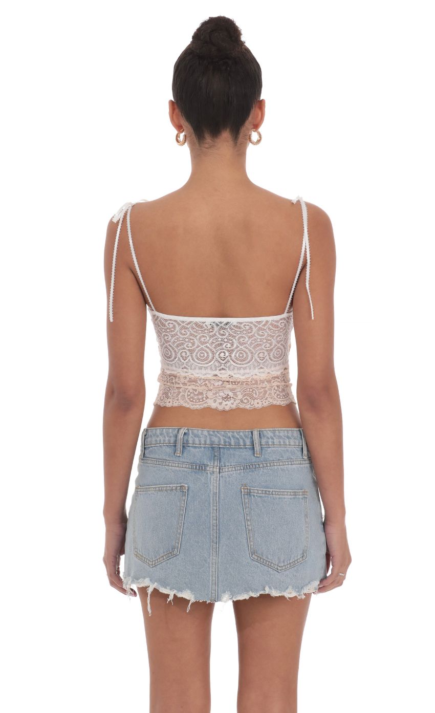 Picture Two Toned Lace Top in White. Source: https://media-img.lucyinthesky.com/data/May24/850xAUTO/2e672e97-c0df-446a-9074-3d353bf74fbf.jpg