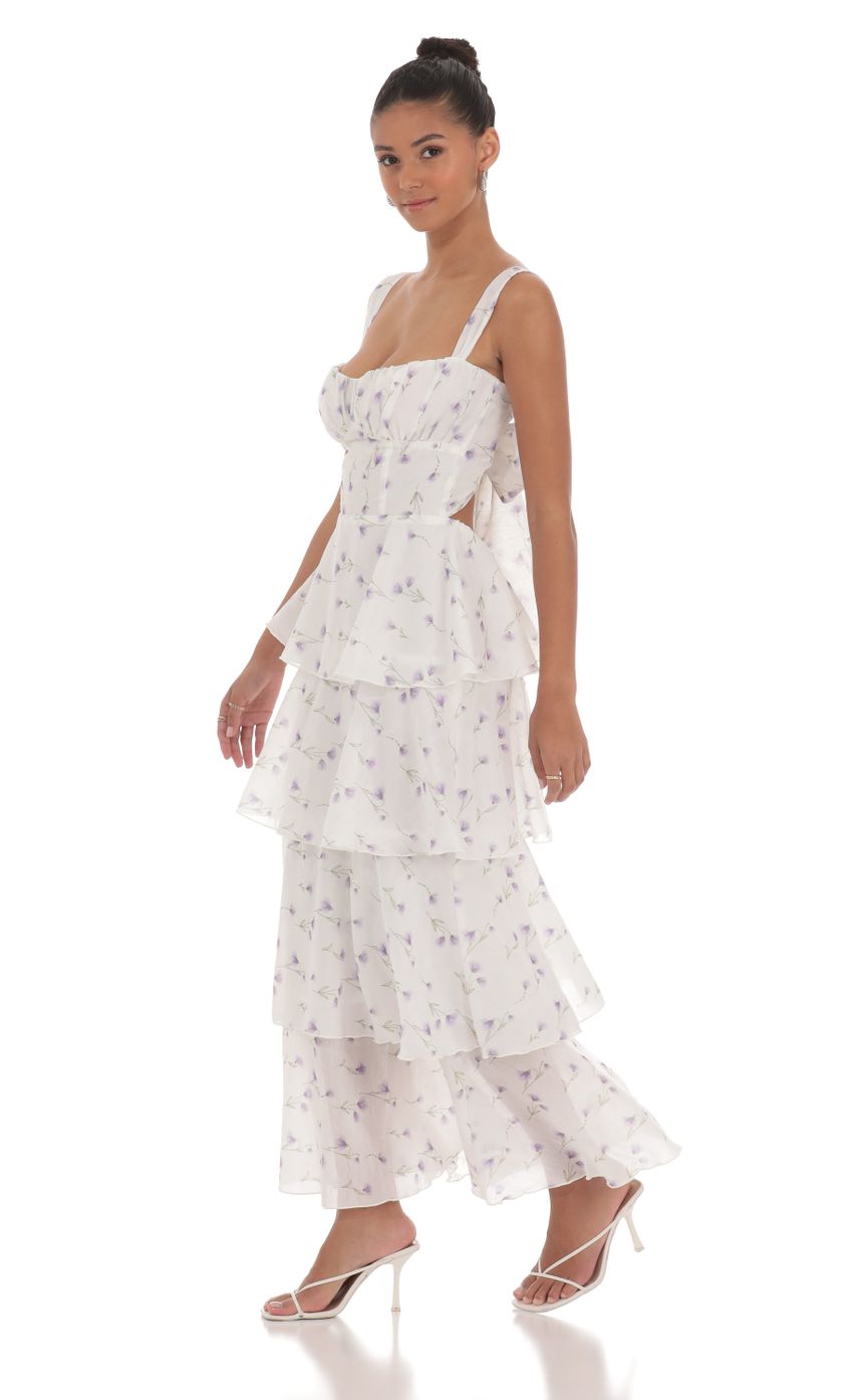 Picture Floral Ruffle Maxi Dress in White. Source: https://media-img.lucyinthesky.com/data/May24/850xAUTO/365c8af4-bd54-4c7f-ba69-f277e056a6b4.jpg