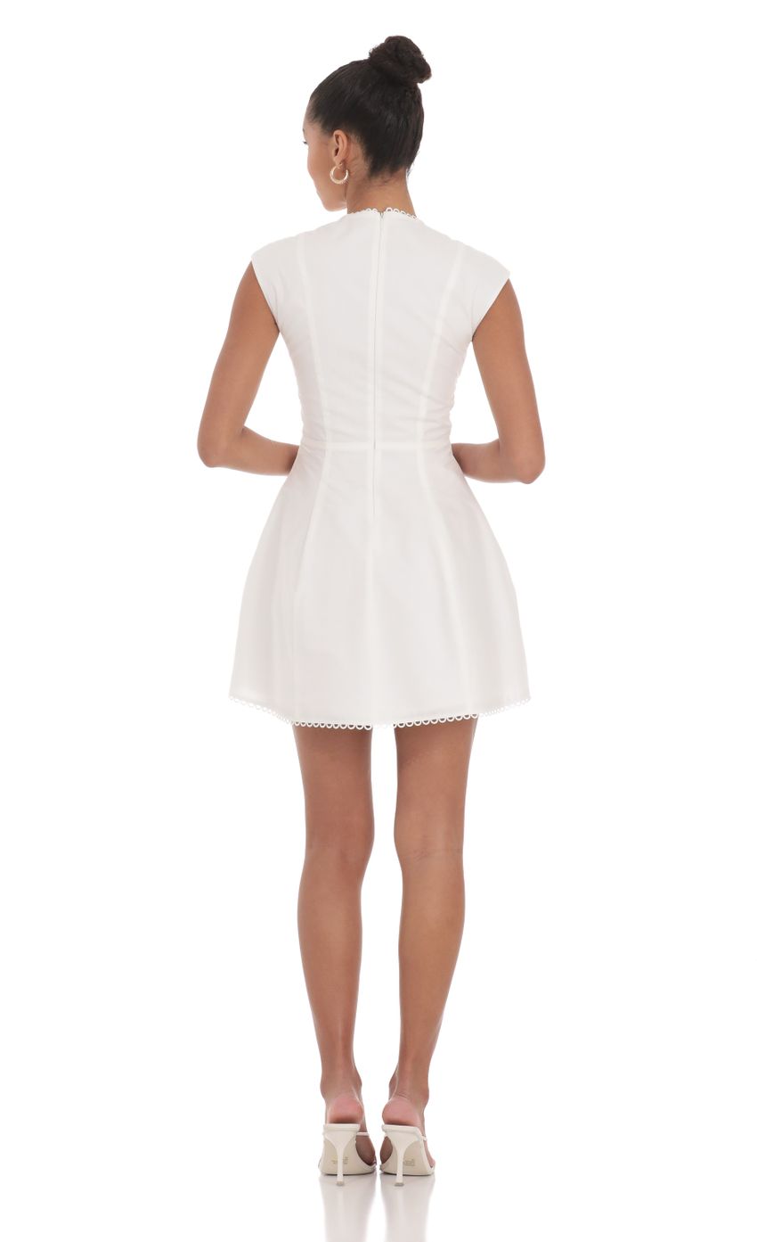 Picture Plunge V-Neck Dress in White. Source: https://media-img.lucyinthesky.com/data/May24/850xAUTO/3898cc5b-6082-4cf4-84fd-723009f3a385.jpg