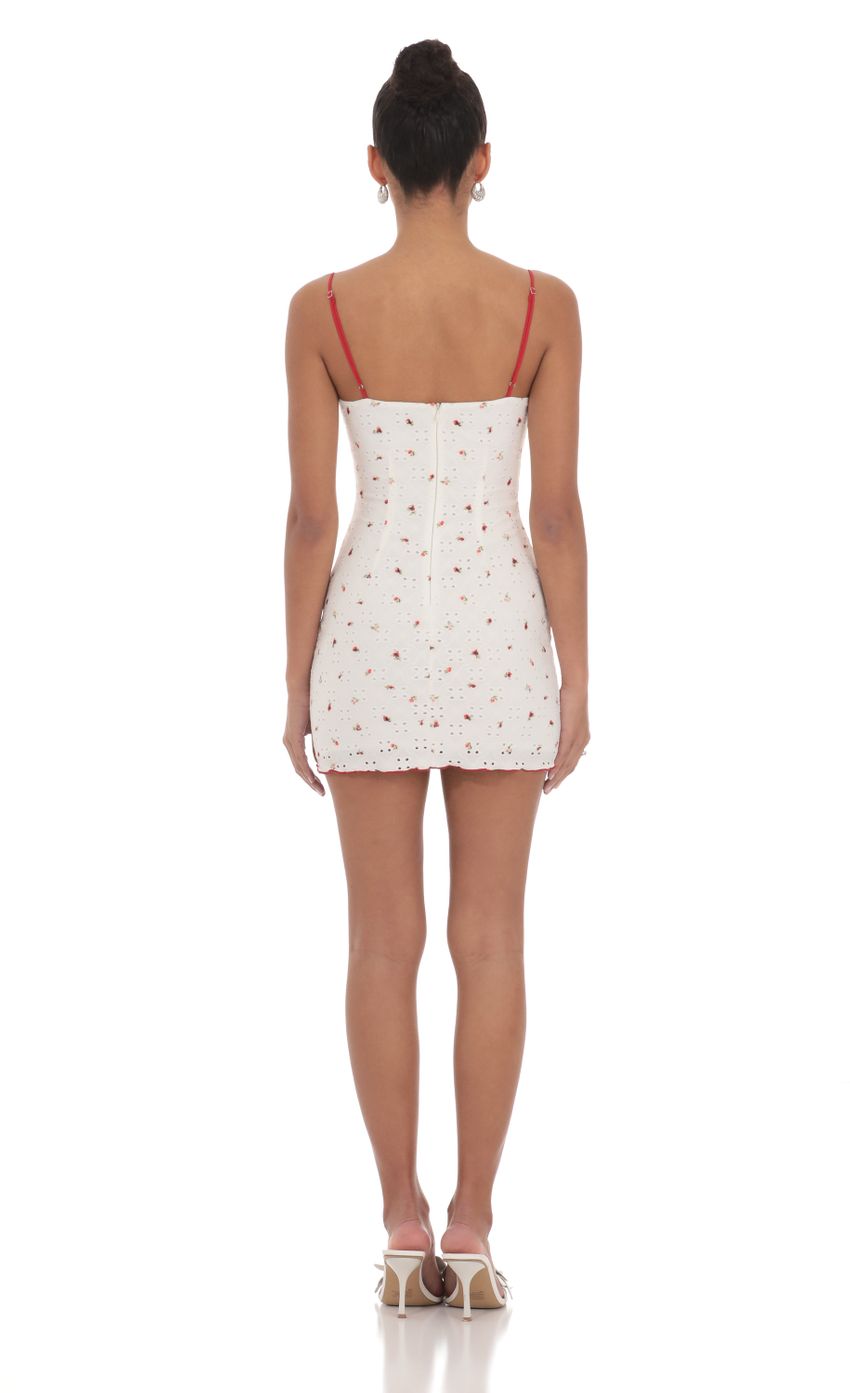 Picture Eyelet Floral Bodycon Dress in White. Source: https://media-img.lucyinthesky.com/data/May24/850xAUTO/3d01195c-ad54-4116-bef1-c4003e5ba7f5.jpg