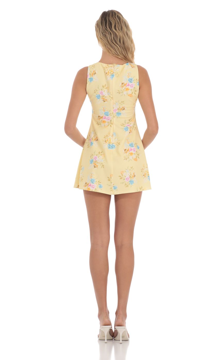 Picture Floral High Neck Dress in Yellow. Source: https://media-img.lucyinthesky.com/data/May24/850xAUTO/3e0a8e75-6865-478c-87aa-3c1de5a02758.jpg