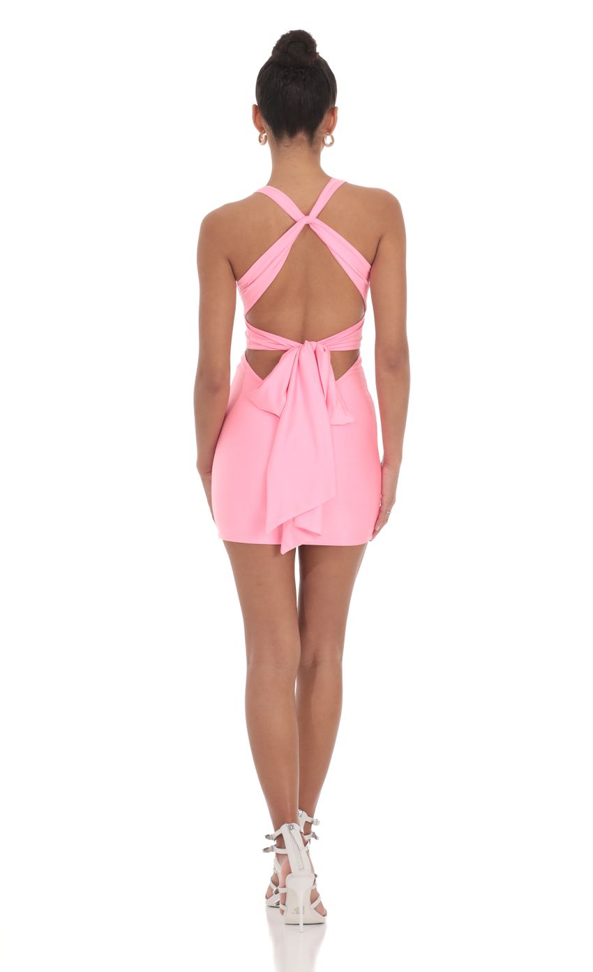 Picture Twist Open Back Dress in Pink. Source: https://media-img.lucyinthesky.com/data/May24/850xAUTO/49779401-5cb8-456c-b29a-333ec57e13bb.jpg