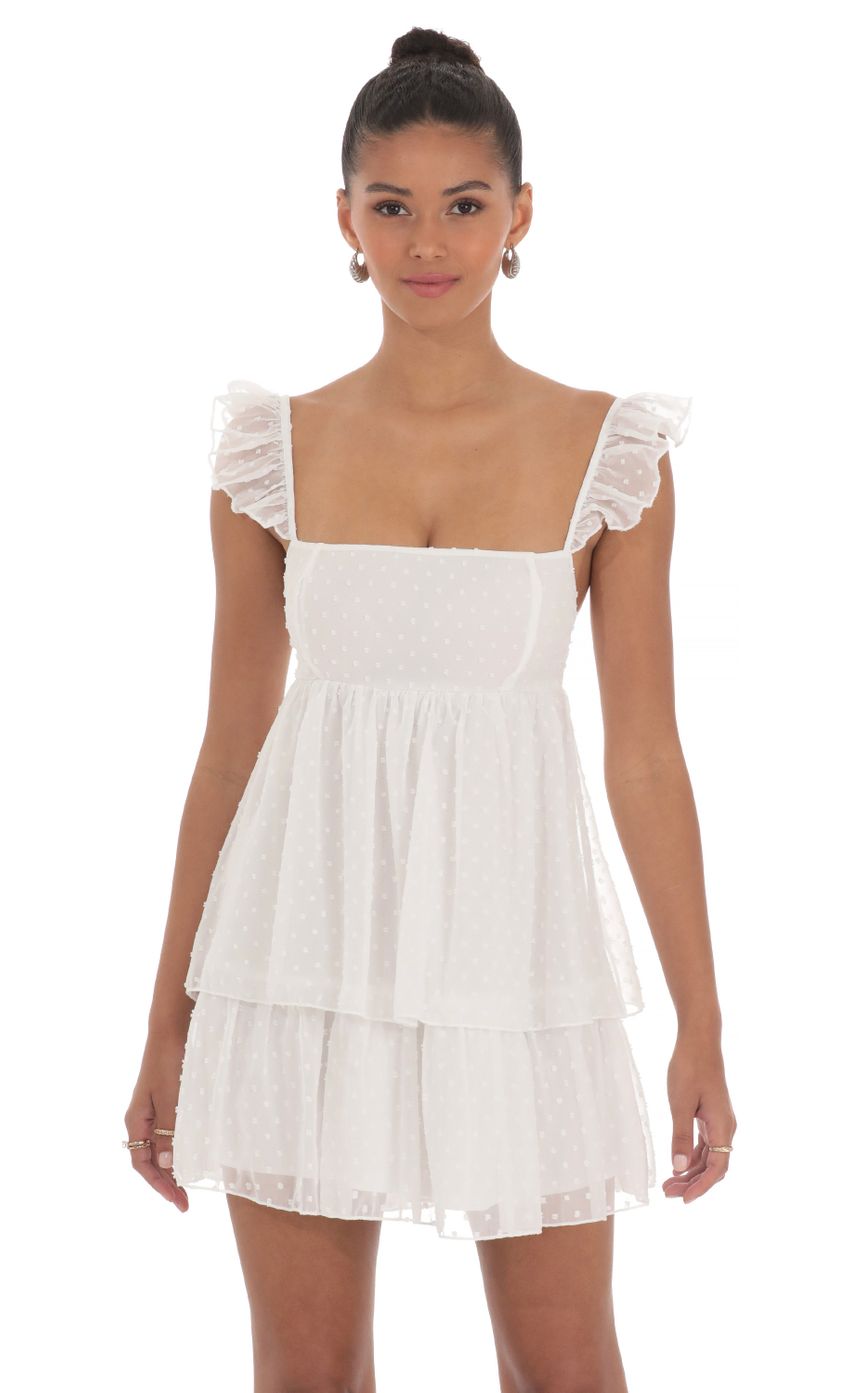 Picture Dotted Ruffle Dress in White. Source: https://media-img.lucyinthesky.com/data/May24/850xAUTO/4d6407df-ac2f-4b15-9f36-380d22e137e4.jpg