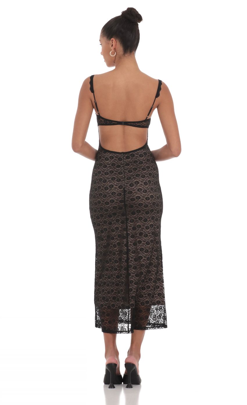 Picture Lace Open Back Midi Dress in Black. Source: https://media-img.lucyinthesky.com/data/May24/850xAUTO/5650a9b6-9c87-4950-99b4-ad55c4f4acfa.jpg