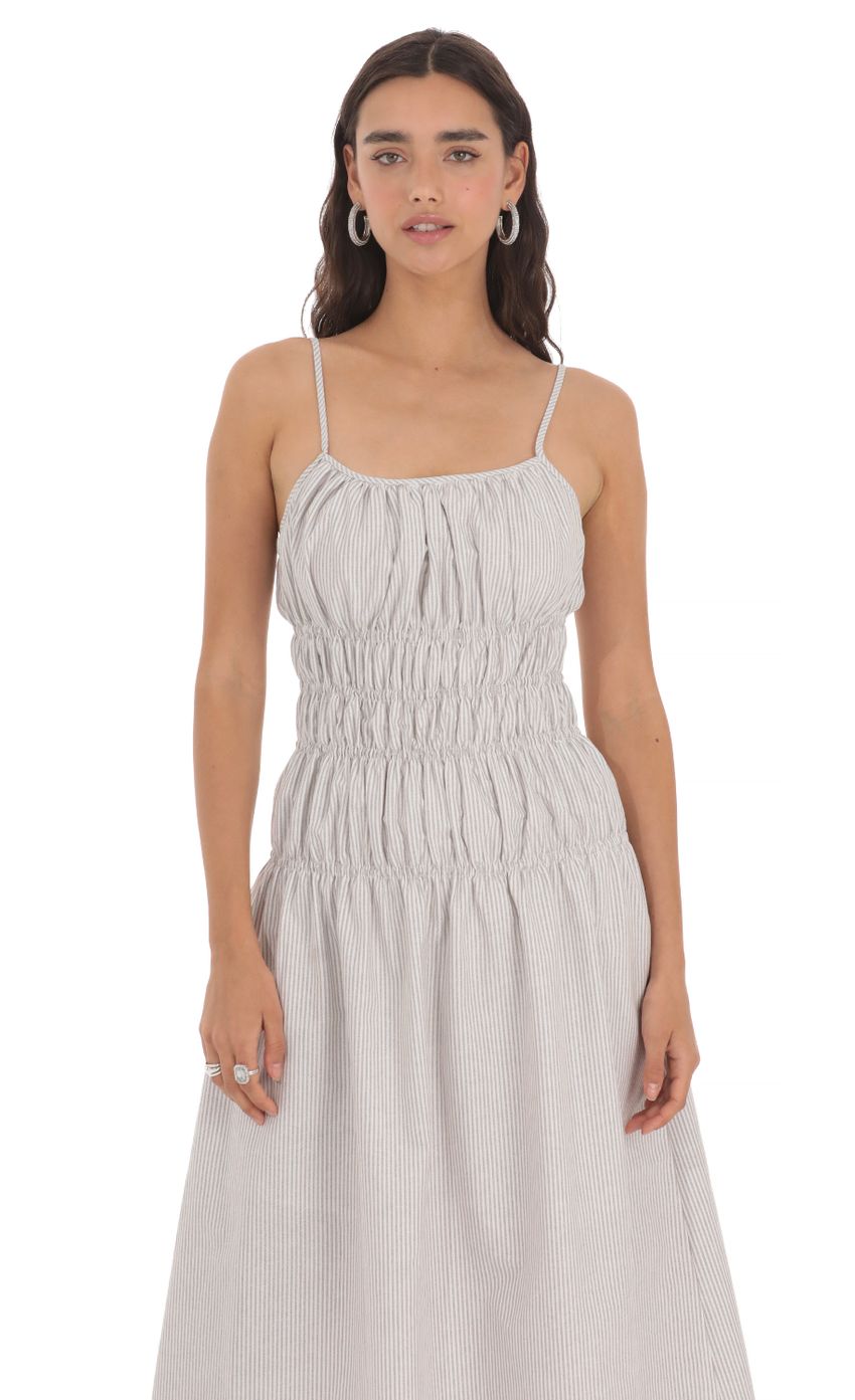 Picture Ruched Striped Midi Dress in Grey. Source: https://media-img.lucyinthesky.com/data/May24/850xAUTO/5944be96-086c-4adb-b491-d936e01eae4e.jpg