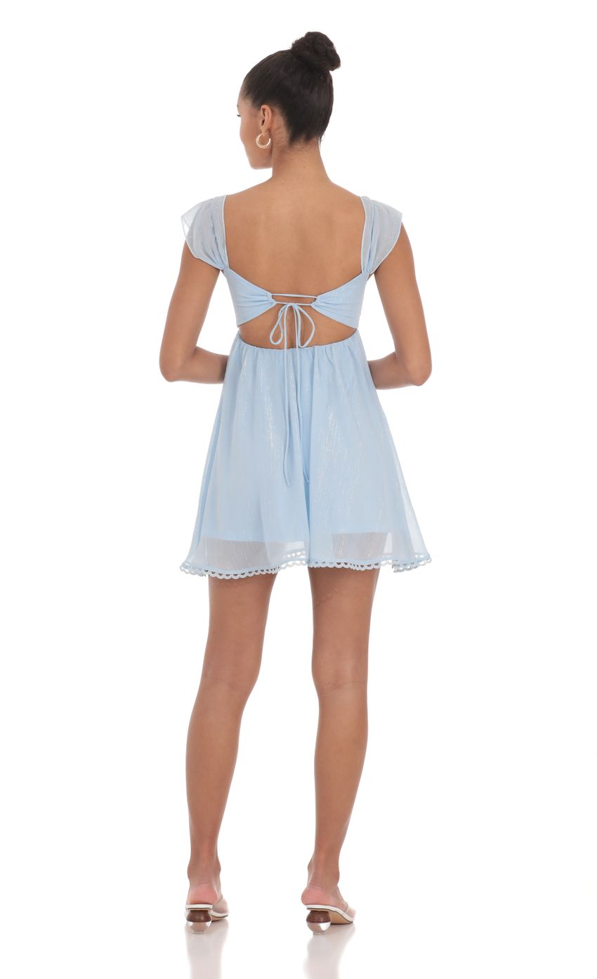Picture Shimmer Embroidered Trim Babydoll Dress in Blue. Source: https://media-img.lucyinthesky.com/data/May24/850xAUTO/59ff3022-6ebe-4c70-a8fb-1dd3af38098a.jpg