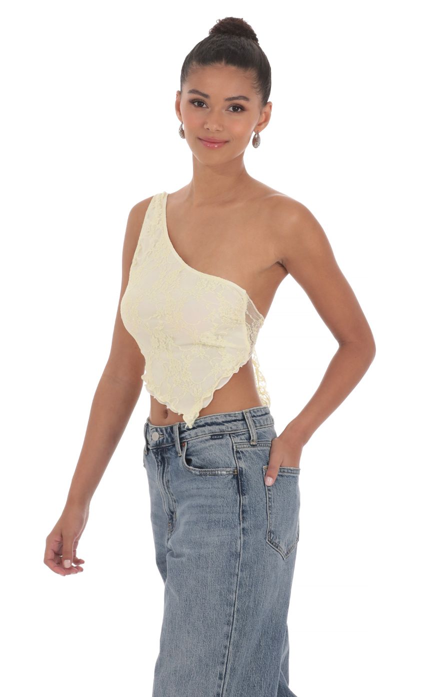 Picture One Shoulder Lace Top in Yellow. Source: https://media-img.lucyinthesky.com/data/May24/850xAUTO/5e10770d-d009-4bbc-bcd0-9dd95f0374a4.jpg