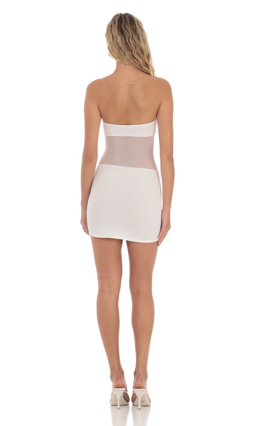 Picture Strapless Mesh Cutout Dress in White. Source: https://media-img.lucyinthesky.com/data/May24/850xAUTO/60f24cce-13c6-44e6-88c5-75a256191bd8.jpg