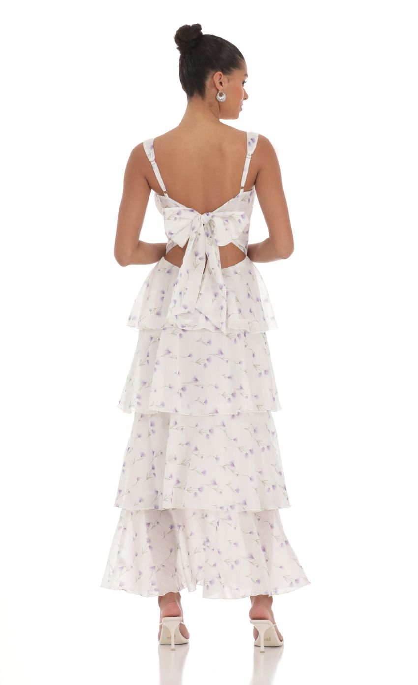 Picture Floral Ruffle Maxi Dress in White. Source: https://media-img.lucyinthesky.com/data/May24/850xAUTO/650894cf-302e-43fc-8b3e-214c83314f06.jpg