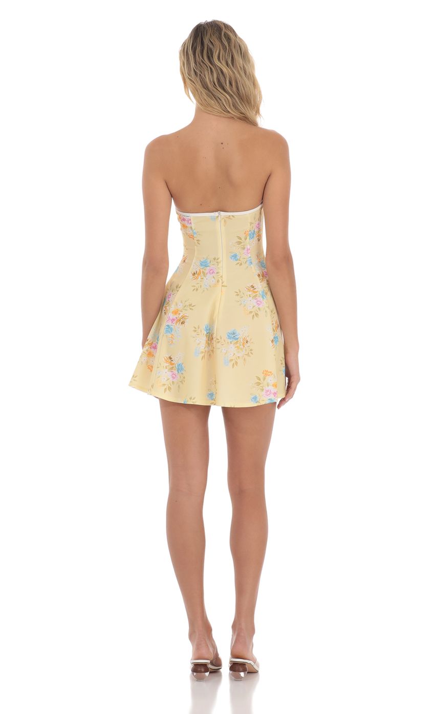 Picture White Trim Floral Fit and Flare Dress in Yellow. Source: https://media-img.lucyinthesky.com/data/May24/850xAUTO/698b328d-9561-4faf-991b-ee92461d2e62.jpg