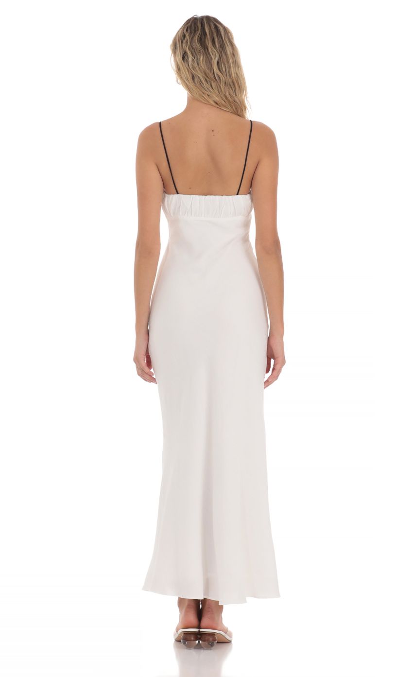 Picture Front Tie Maxi Dress in White. Source: https://media-img.lucyinthesky.com/data/May24/850xAUTO/6f3d3d4e-b395-477d-a537-0fb953c4d36c.jpg