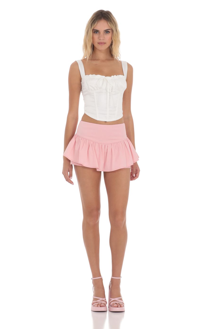 Picture Peplum Skort in Pink. Source: https://media-img.lucyinthesky.com/data/May24/850xAUTO/712b9fc3-3e1b-4d8d-8da3-8c973bbc8590.jpg