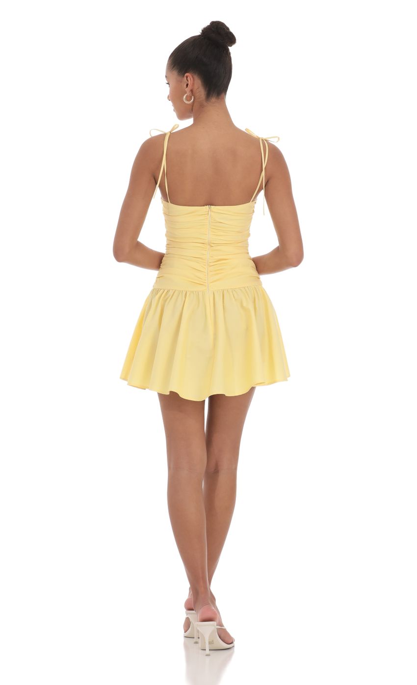 Picture Ruched Fit and Flare Dress in Yellow. Source: https://media-img.lucyinthesky.com/data/May24/850xAUTO/751f692b-e368-4d7a-b3b0-846143b76b9e.jpg