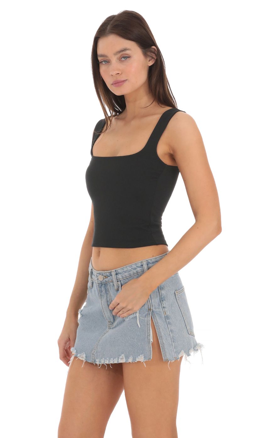 Picture Scoop Tank Top in Black. Source: https://media-img.lucyinthesky.com/data/May24/850xAUTO/7994b5d8-af30-4f5c-9c49-3e8527c4cbbf.jpg