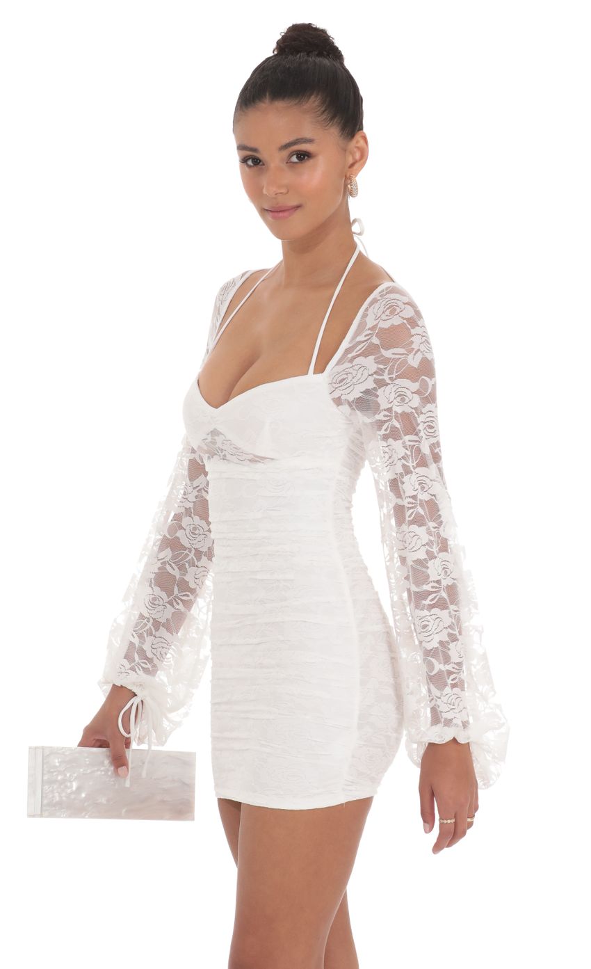 Picture Lace Ruched Long Sleeve Dress in White. Source: https://media-img.lucyinthesky.com/data/May24/850xAUTO/7d59b112-4118-42a3-8c85-f43a48b63abb.jpg