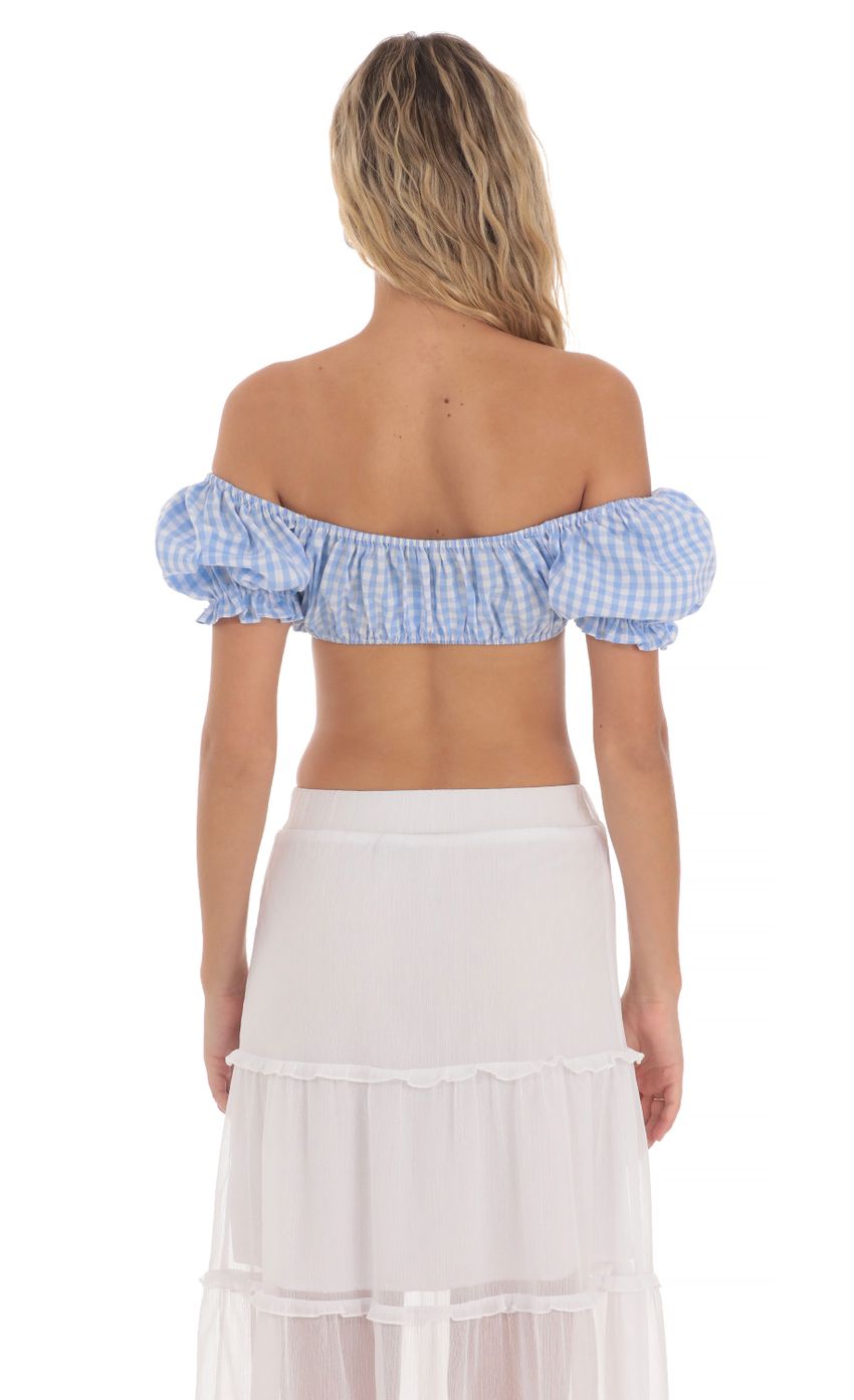 Picture Gingham Off Shoulder Top in Blue. Source: https://media-img.lucyinthesky.com/data/May24/850xAUTO/8a852c04-4bc8-49c2-82ce-b840c2882876.jpg