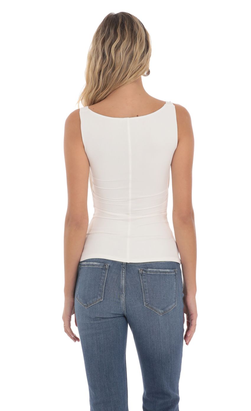 Picture Plunge Cutout Top in White. Source: https://media-img.lucyinthesky.com/data/May24/850xAUTO/8e349371-2afa-4d7c-86c3-be94a2601b4f.jpg