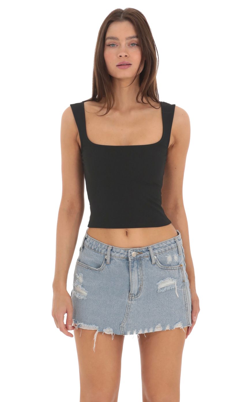Picture Scoop Tank Top in Black. Source: https://media-img.lucyinthesky.com/data/May24/850xAUTO/91e02b21-1593-4e98-8075-1615e139d016.jpg
