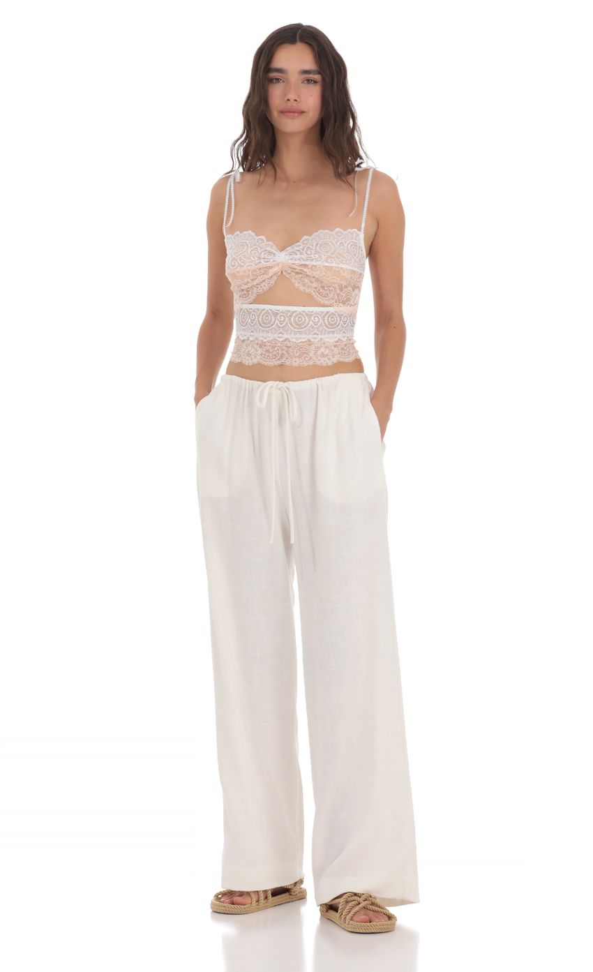 Picture Linen Drawstring Pants in Cream. Source: https://media-img.lucyinthesky.com/data/May24/850xAUTO/93c9db2f-036a-4812-8cdd-59ec5cd67aa9.jpg