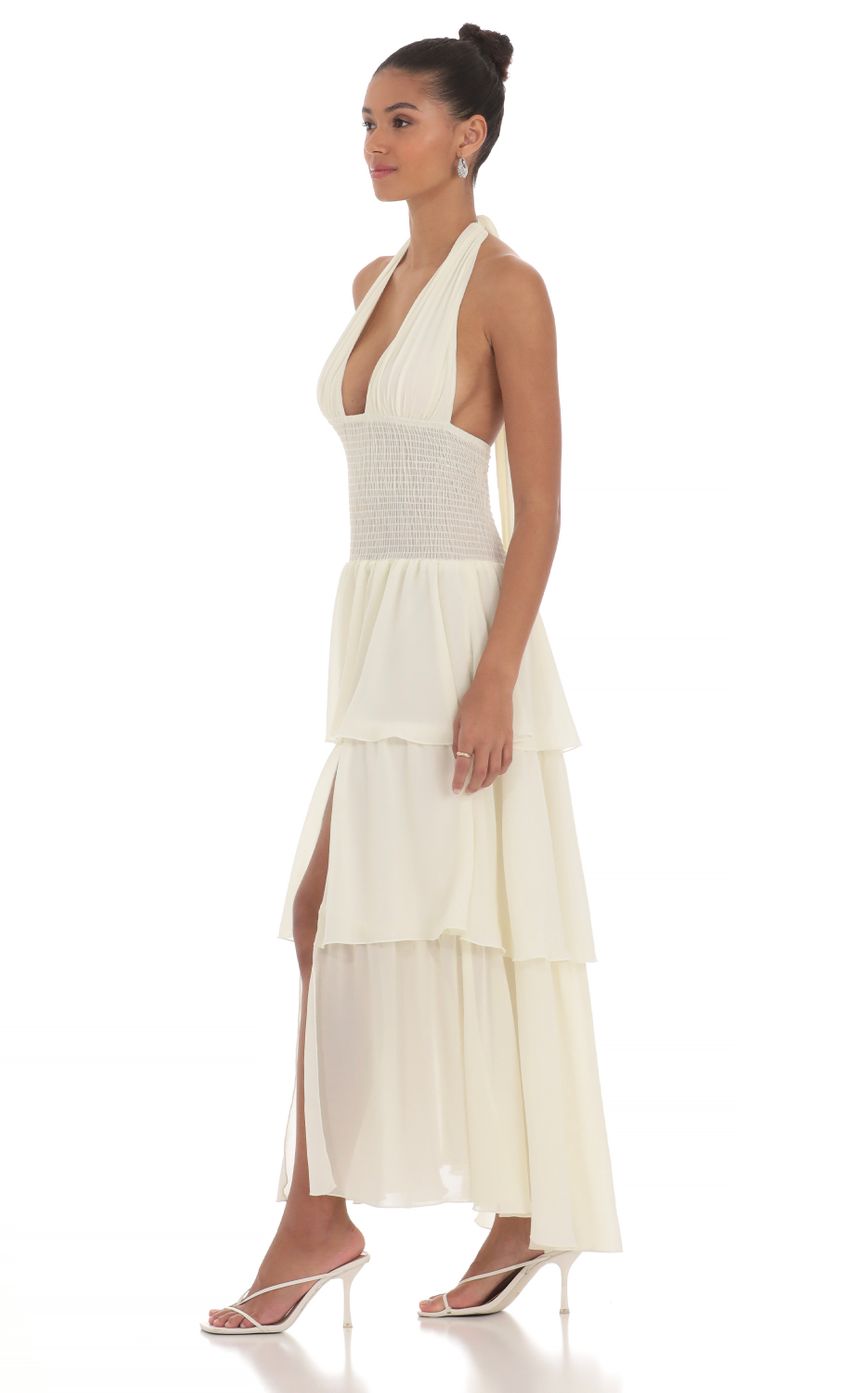 Picture Smocked Halter Maxi Dress in Cream. Source: https://media-img.lucyinthesky.com/data/May24/850xAUTO/a083be9f-bb14-464d-a161-30f6cb68f80b.jpg