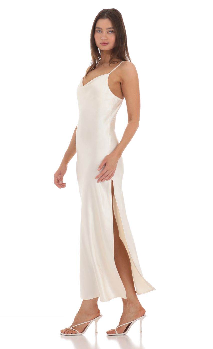 Picture Satin Cowl Neck Maxi Dress in Cream. Source: https://media-img.lucyinthesky.com/data/May24/850xAUTO/a2281f90-cc33-44f9-830c-93ce6f7d57ee.jpg
