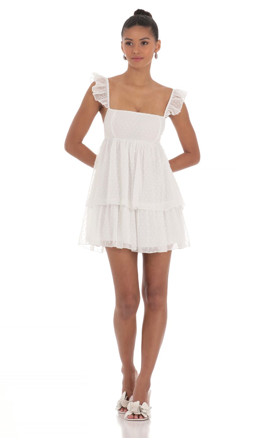Picture Dotted Ruffle Dress in White. Source: https://media-img.lucyinthesky.com/data/May24/850xAUTO/a75f1690-8a07-4b8c-8706-1b3090bf1cd6.jpg