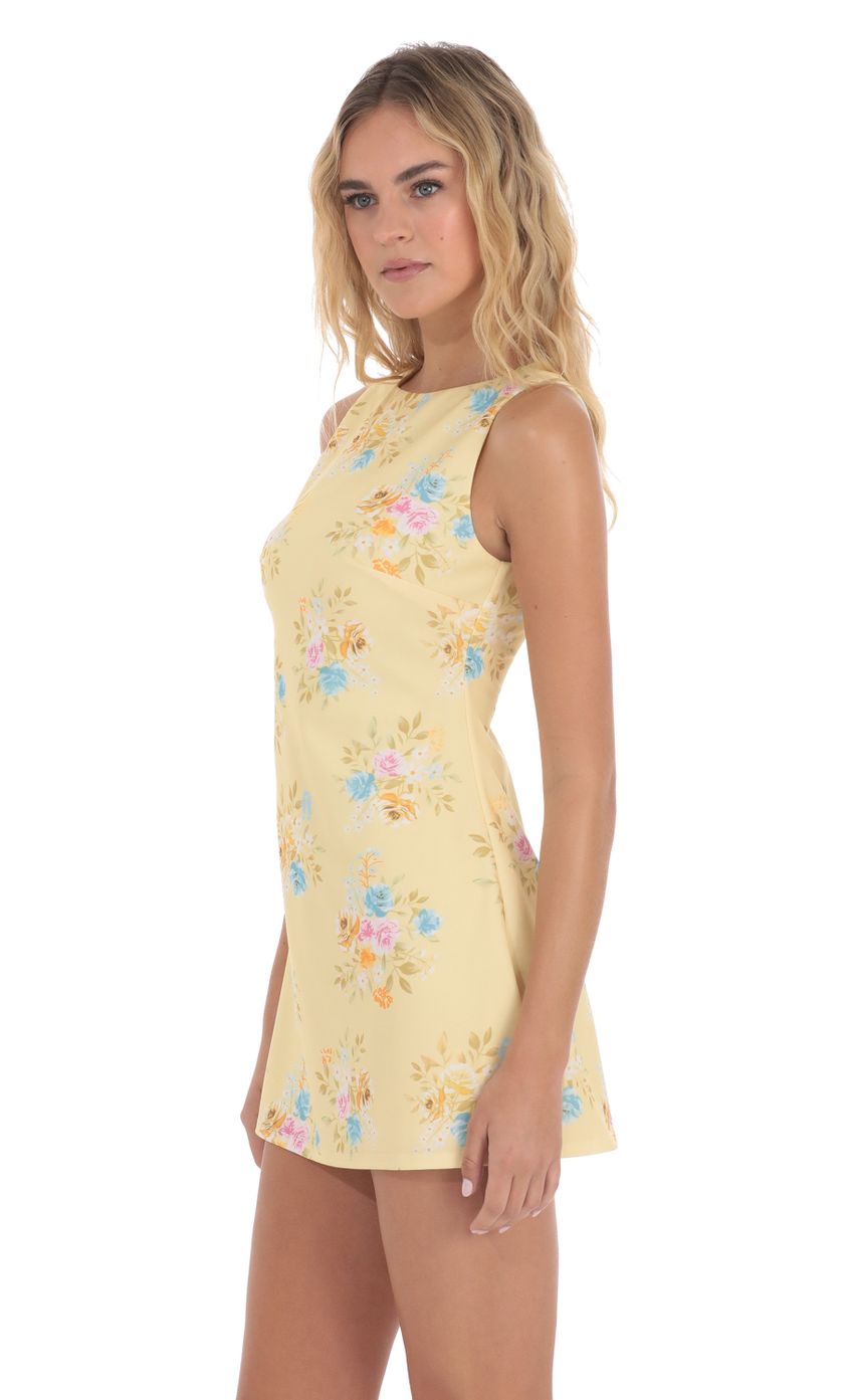 Picture Floral High Neck Dress in Yellow. Source: https://media-img.lucyinthesky.com/data/May24/850xAUTO/a7f2417e-98ad-4b01-8b9f-cd56ef7a6347.jpg