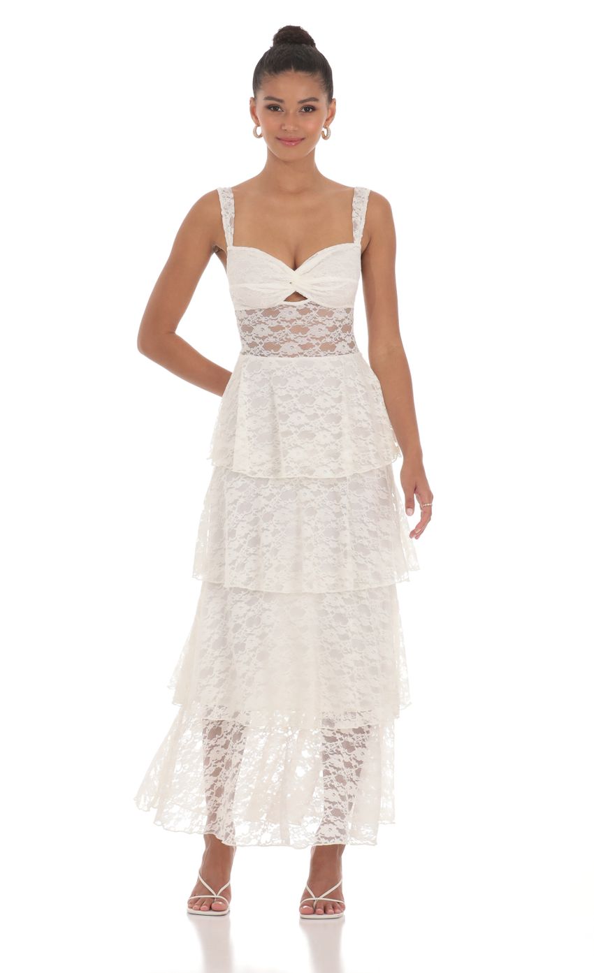 Picture Twist Front Lace Ruffle Maxi Dress in White. Source: https://media-img.lucyinthesky.com/data/May24/850xAUTO/ac8a768b-14dc-44b7-b337-44d80475e699.jpg