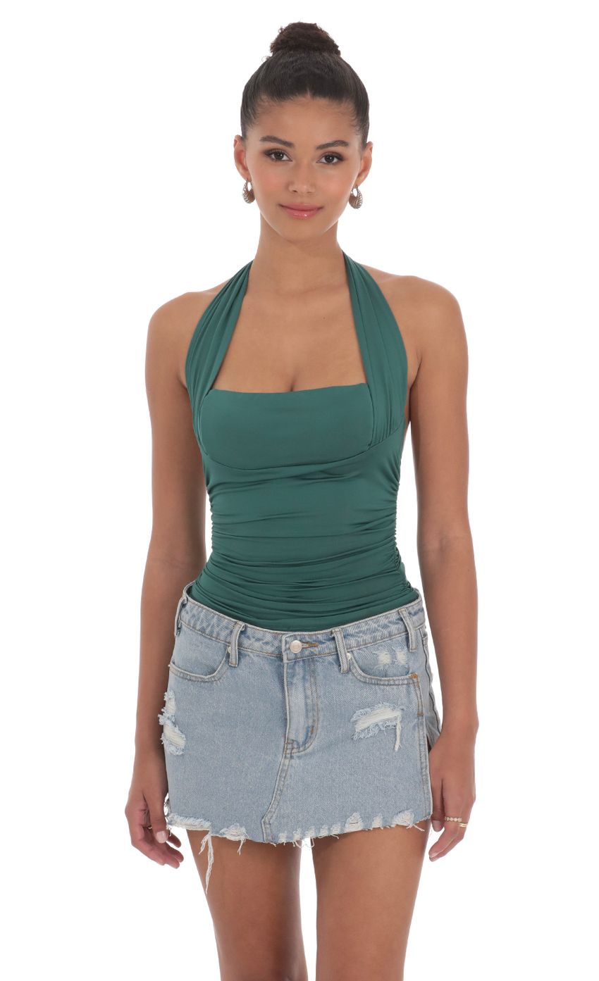 Picture Halter Ruched Top in Hunter Green. Source: https://media-img.lucyinthesky.com/data/May24/850xAUTO/bd494707-f94a-4649-befb-ff15d3d52612.jpg