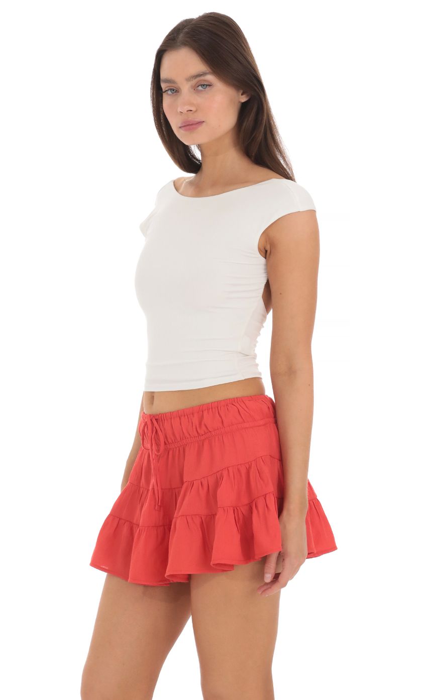 Picture Flare Skort in Coral Red. Source: https://media-img.lucyinthesky.com/data/May24/850xAUTO/c0f3f487-f52b-433a-98da-50bbb2a84a39.jpg